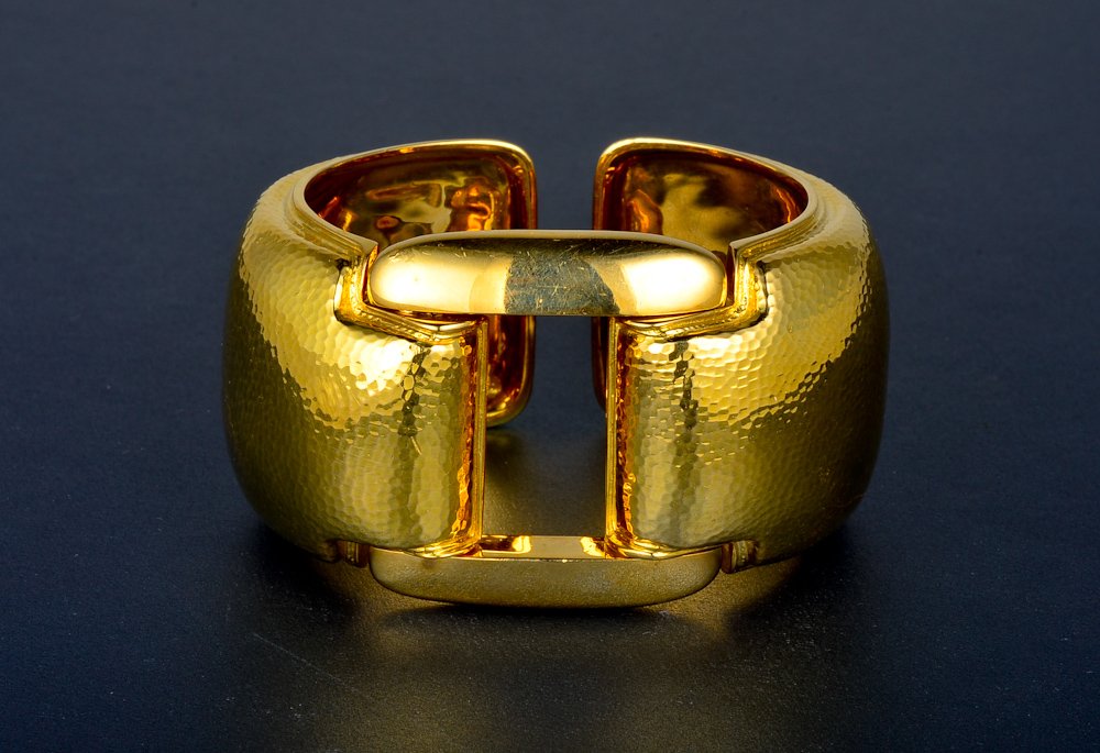 "David Webb wide buckle like gold bangle": David Webb wide buckle like hammered gold bangle. Dimension: 1 1/2" wide Signed: Webb 18K Gross weight: 85.8 dwt