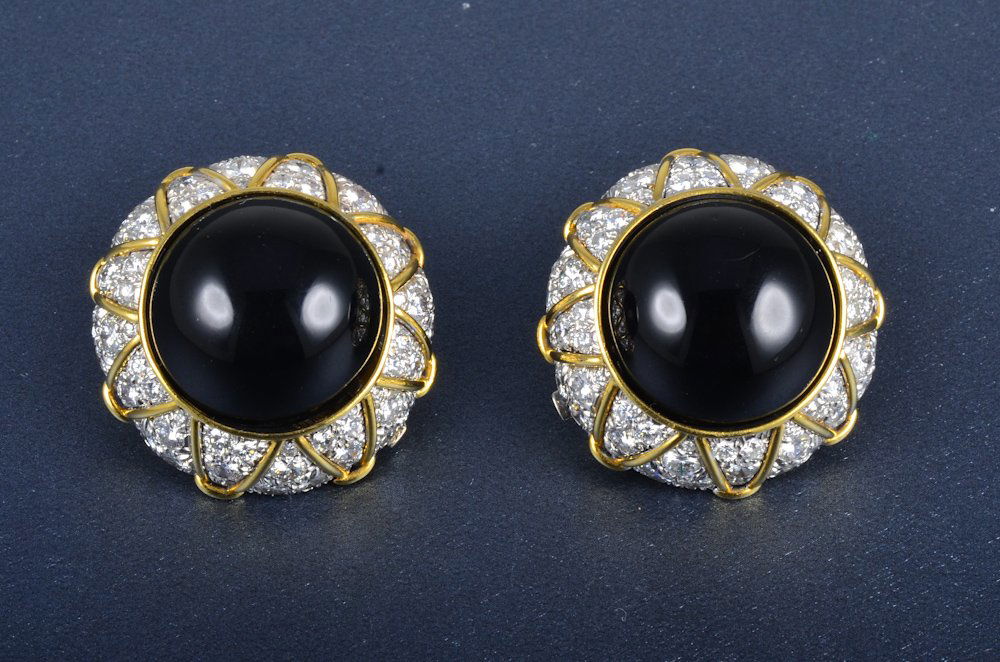 David Webb 18K and platinum diamond and onyx ear c: David Webb 18K and platinum diamond and onyx ear clips. The cab stone interchangeable. 136 high quality full cut diamond weighing approx 9 ct. Signed: Webb18K.Plat. Dimension 1 1/4 diameter Signed: Ti