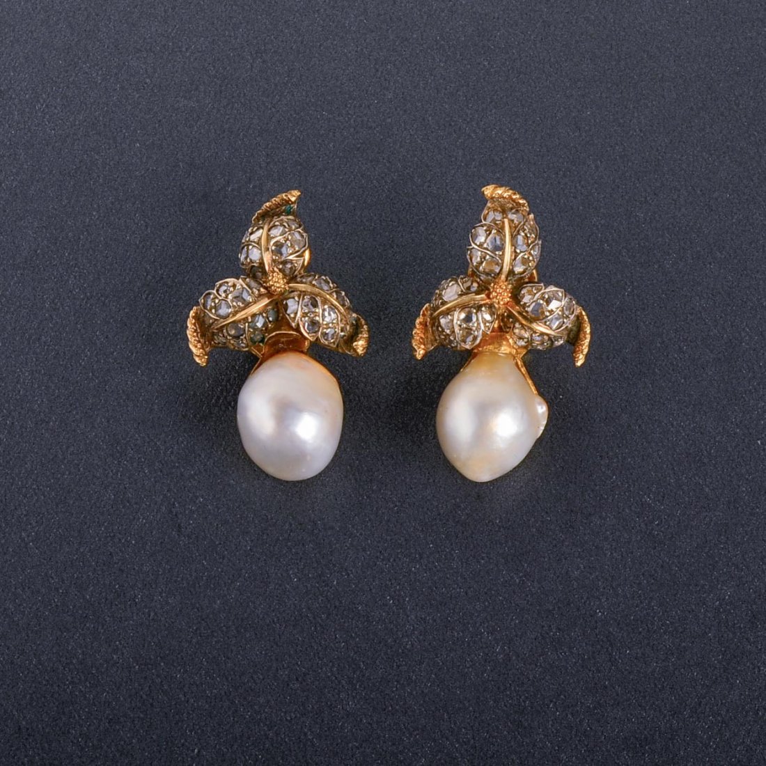 Buccellati Diamond and Pearl Earrings: Buccellati silver on gold diamond and pearl clip back earrings Signed Gianmaria buccellati Italy 18K Two pearls each measures approx. 12mm x 16mm 72 rose cut diamonds Measurement 20mm x 35mm