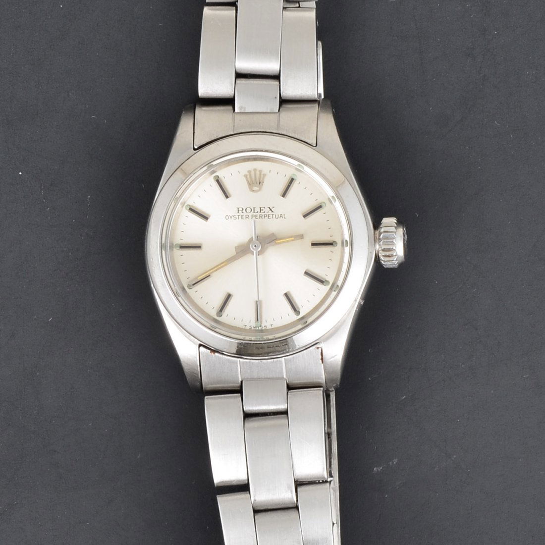 Rolex Stainless Steel Automatic Women Wristwatch: "Signed Rolex Oyster Perpetual on face. Stainless steel women wristwatch. The watch comes with original oyster bracelet stamped 7834.13.266. It is quick set and has a deployment buckle. The watch weig