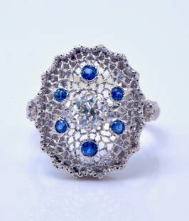 Mario Buccellati 18K White Gold-Diamond-Sapphire ring: Brand: M. Buccelati Condition: Excellent Material: 18K White Gold Stone: Sapphire-0.30CT and Diamond-0.35CT Weight: 7.1 grams Measurements: 7.25 CIRCA: 1990