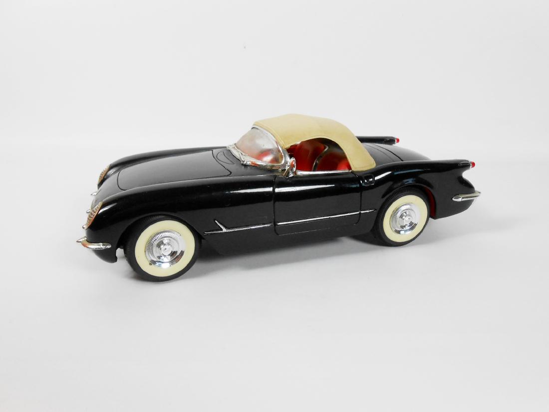 Precison Model 1954 Corvette: 1954 Chevy Corvette. Black with red interior. Made in Spain by Mira, circa early 1970's. Scale 1/18. L. 9 1/2 inches.