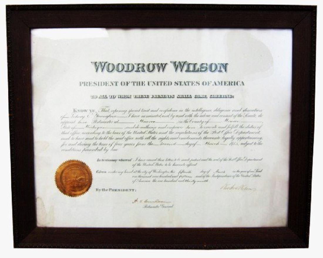 1915 Woodrow Wilson Presidential Document: Appointment certificate signed by President Woodrow Wilson designating Sidney Younglove as Postmaster, Monroe, Michigan. Dated March 15, 1915. 13 1/2 x 17 1/2 inches. Not examined out of frame. Appear