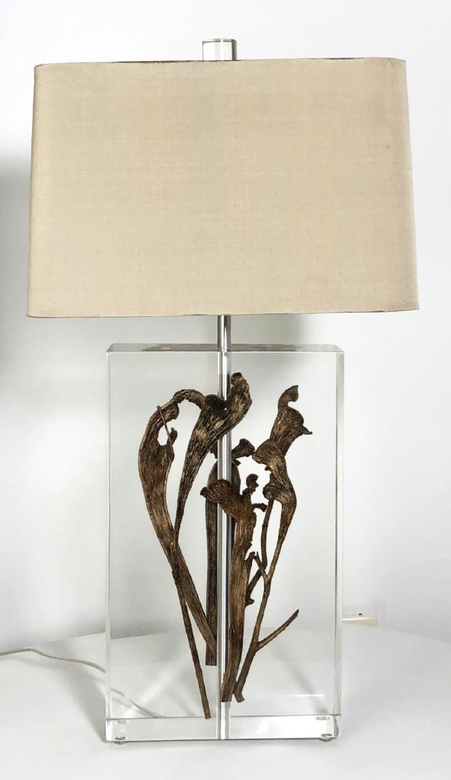 Designer Lamp With Silk Shade: Designer table lamp by Van Teal. Acrylic base with floral sculpture. Signed and numbered. Custom silk shade measuring 16 x 9 3/4 x 10 inches. Overall height is 30 inches. Lamp measures 10 1/4 inches w