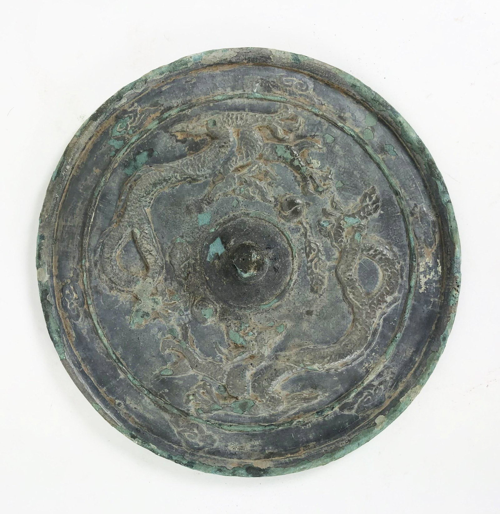 Han Dynasty Dragon Mirror: Round bronze mirror plate with dragons, Chinese, possibly Han Dynasty or later. Dia. 9 inches