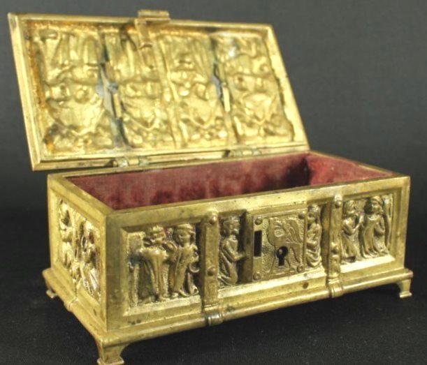 Gilt Bronze Jewelry Box, Circa 19th Century: Gilt bronze jewelry box, 19th century. Having a hinged lid and decorated with numerous religious figures in the Renaissance style. H. 2 1/2 inches. W. 5 1/2 inches.