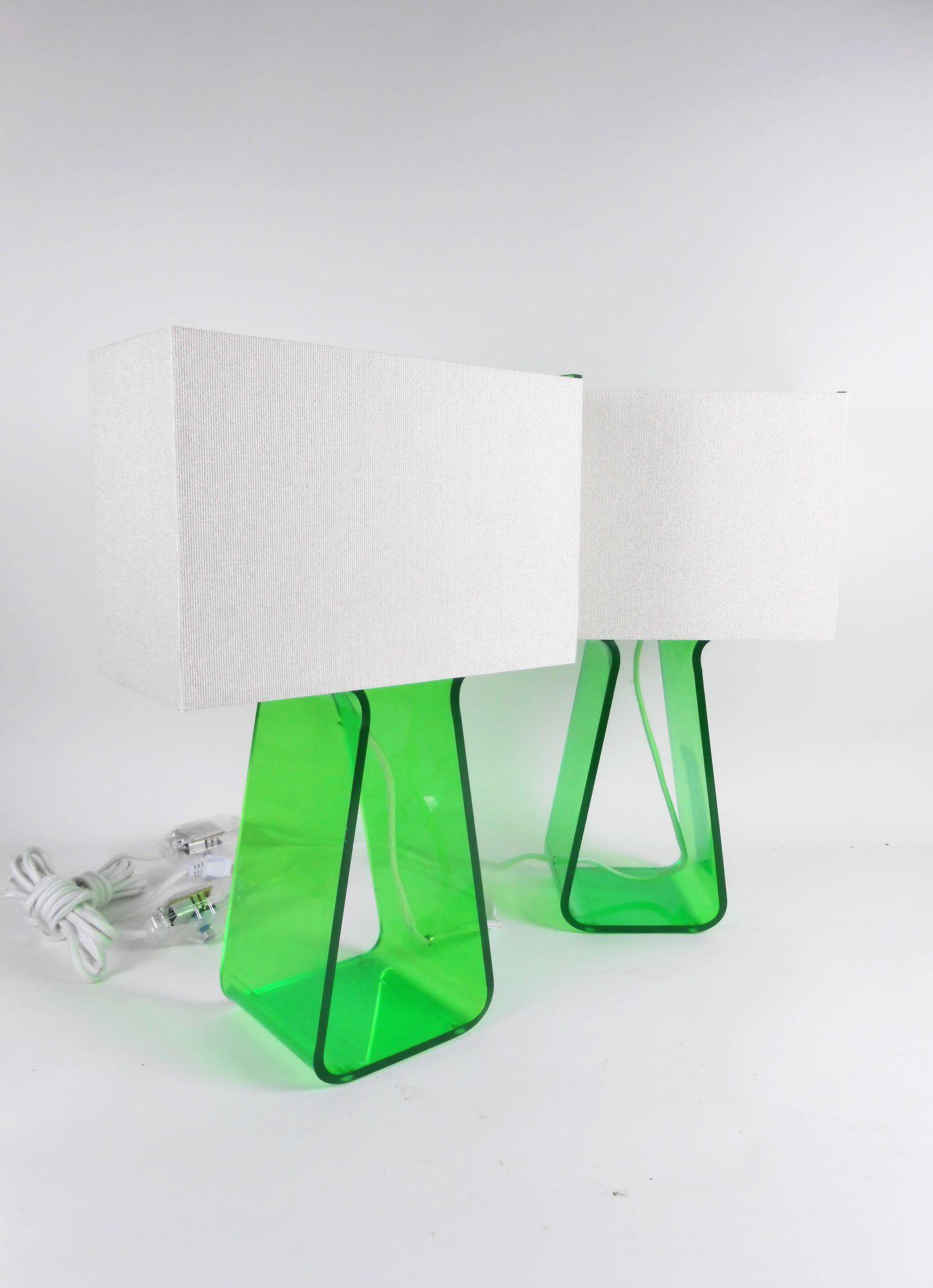 Pair Of Designer Table Lamps By Pardo: Pair of green lucite boudoir table lamps by Pablo Pardo. Excellent condition. H. 14 1/2 inches.