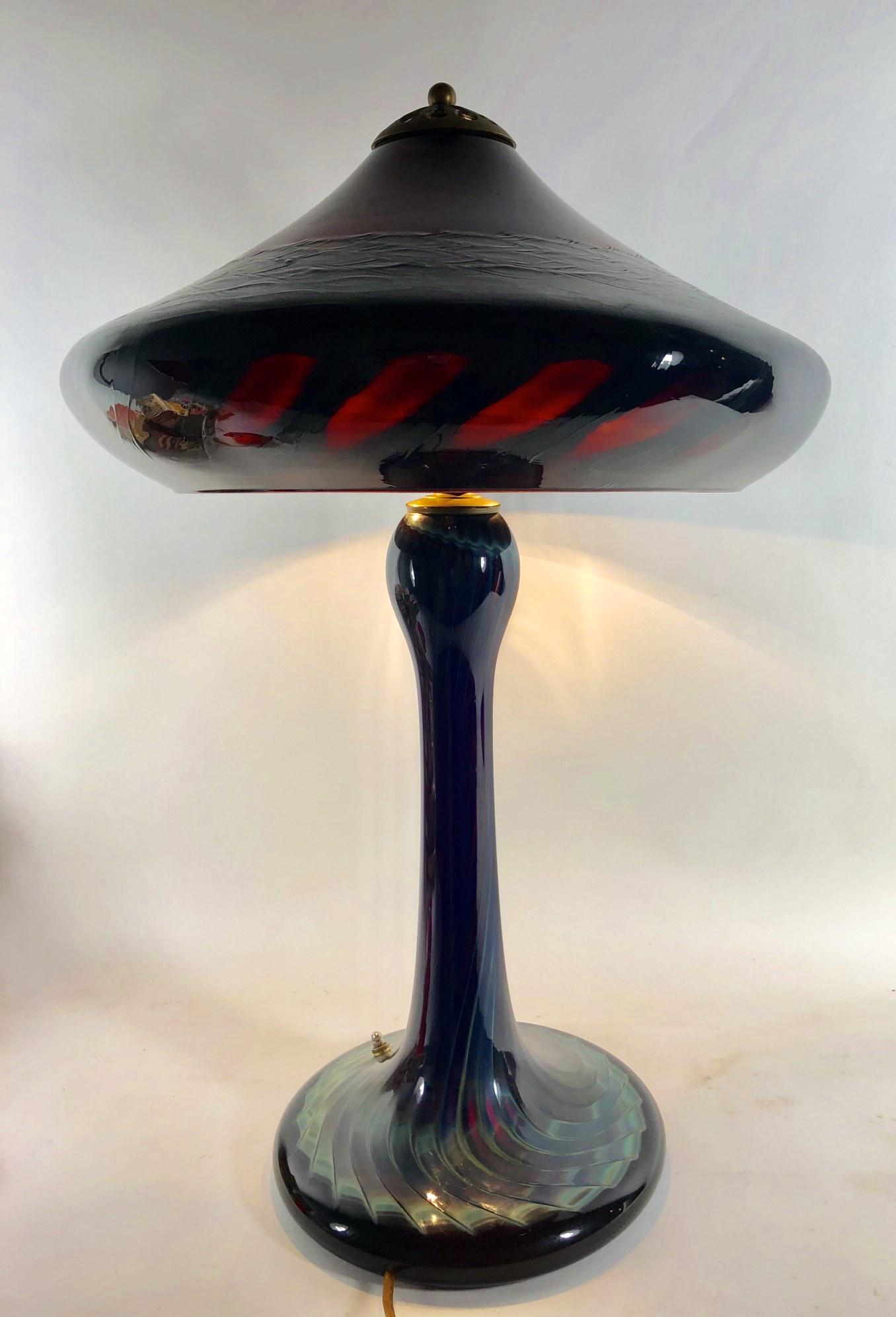 Art Glass Lamp, Signed: Art glass table lamp, artist signed and numbered. 20th century. Very good condition. H. 25 inches. Width of shade, 16 inches.
