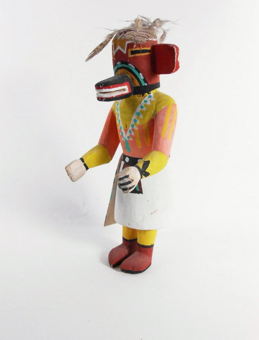 Native American Kachina Doll: Painted carved wood Kachina doll, Hopi, circa 20th century. H. 11 1/2 inches. Provenance: Property of a prominent Dallas ethnographica collector