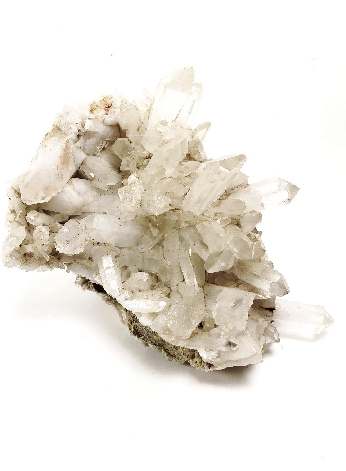 Natural Quartz Crystal Formation: Natural formation of quartz crystal. Measures approximately 15 inches long, 11 inches high, and 8 inches wide.