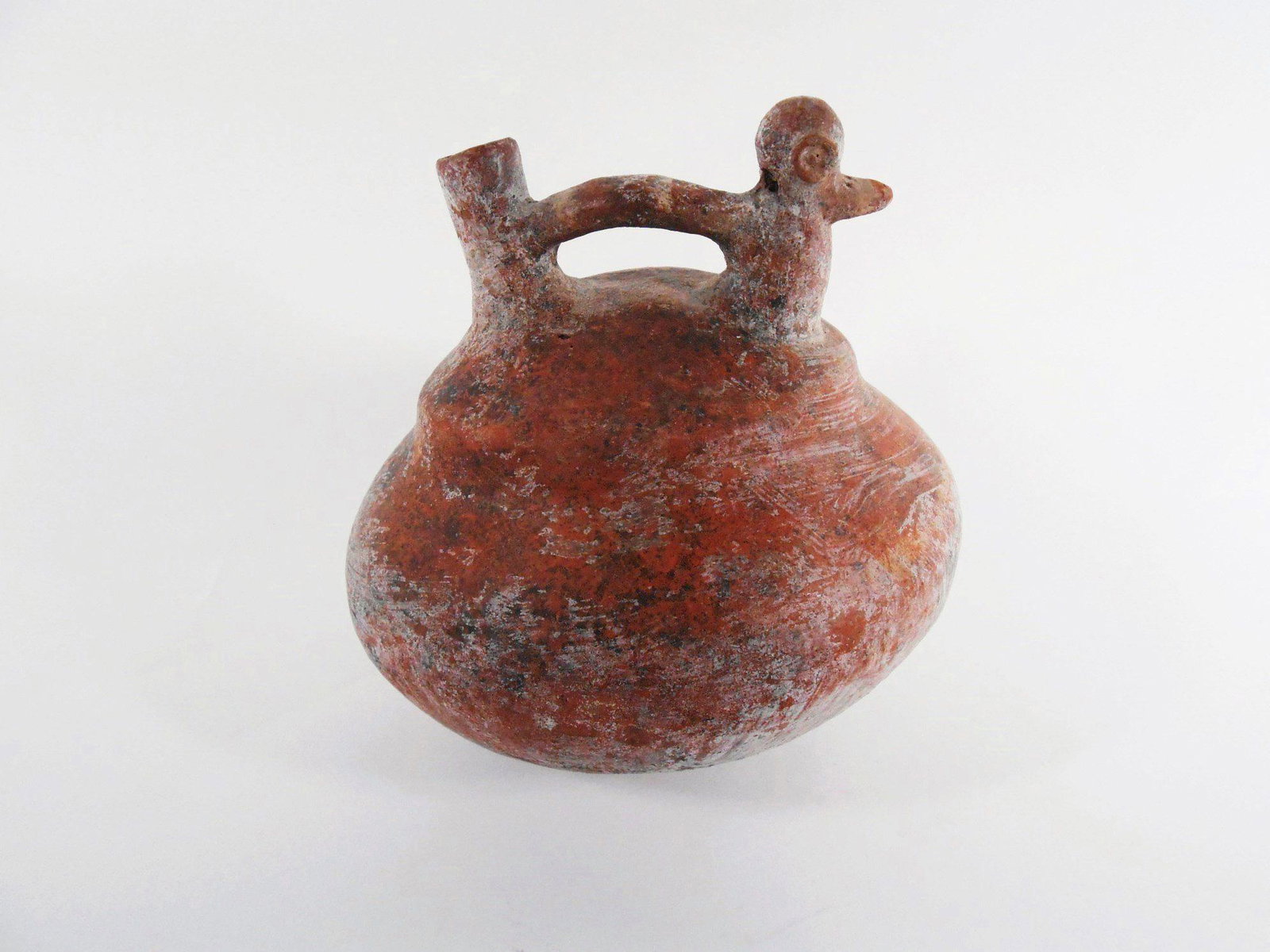Pre-Columbian Terracotta Vessel: Pre-Columbian terracotta vessel with handle and bird-form spout. H. 7 inches W. 7 1/2 inches Provenance: Property of a prominent Dallas ethnographica collector Note: Preston Hall Gallery has not had t