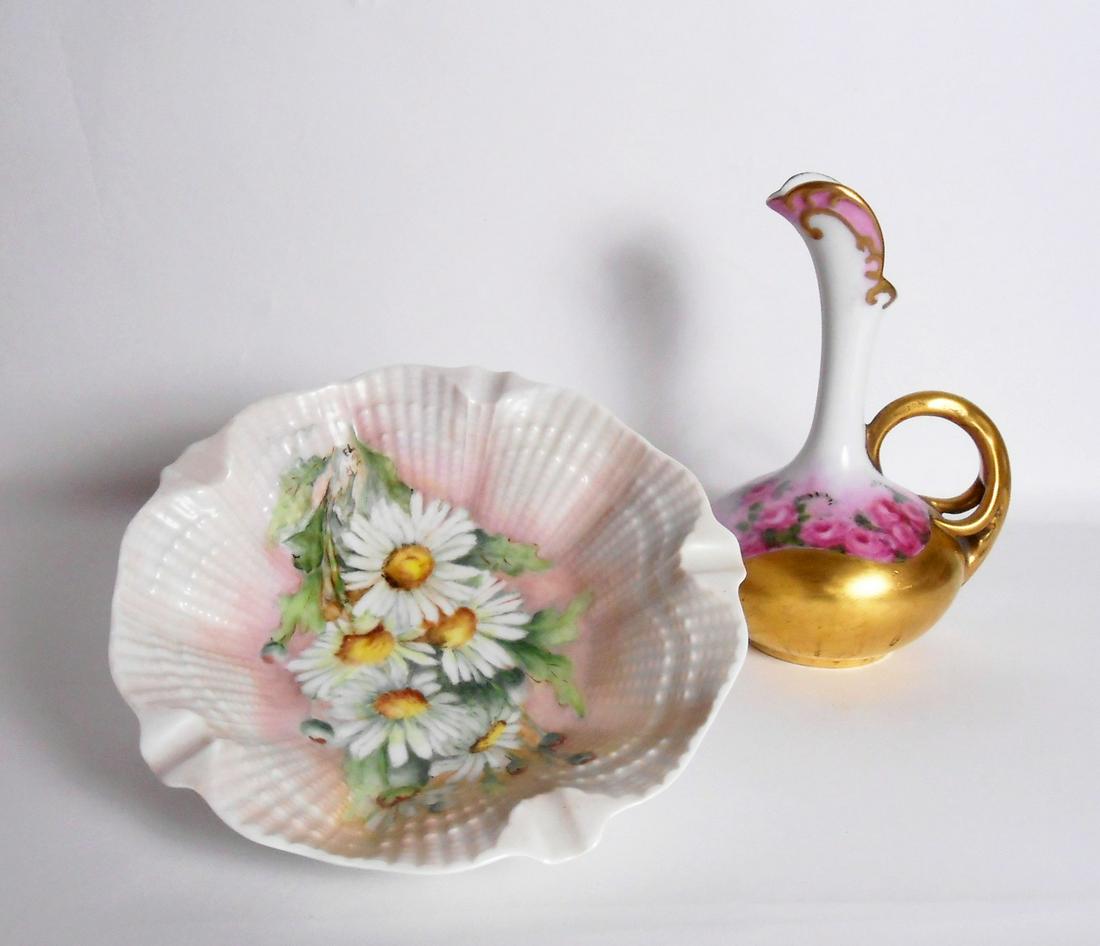 Limoges Bowl & European Porcelain Ewer: Finely painted Limoges porcelain bowl, together with a delicately painted & gilt porcelain ewer, probably Continental. Dia. of bowl: 7 3/4 inches. Both pieces in very good condition.