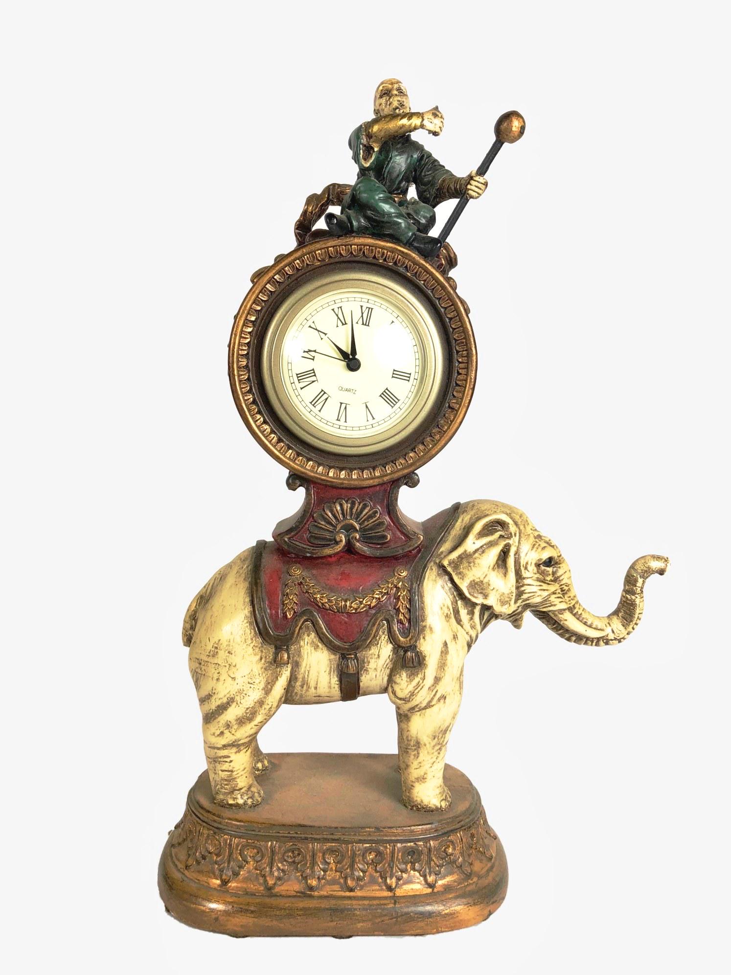 Elephant-Form Mantel Clock, 20th Century: Elephant-form mantel clock, ceramic or composite material, Chinese, circa late 20th century. Quartz clock movement. H. 13 1/4 inches.