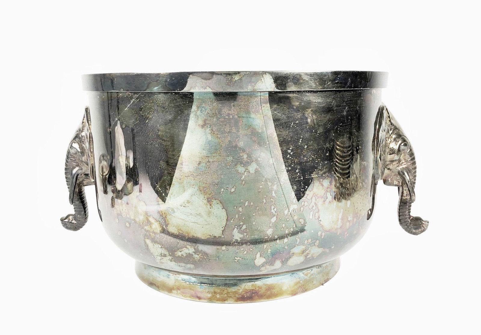 Silverplated Jardiniere, 20th Century: Silverplated jardiniere with elephant-head decorations, unmarked (possibly English). Circa late 20th century. Dia. 12 1/2 inches. H. 8 1/4 inches.