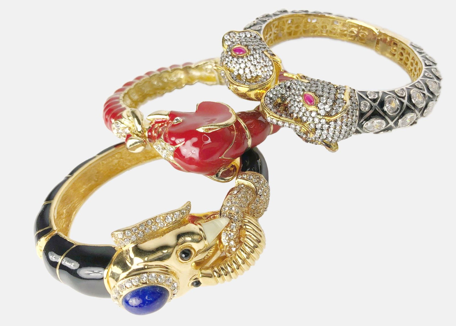 Three Elephant Bangle Bracelets, Ciner: Three finely crafted elephant-motif bangle bracelets, one signed CINER. All appear to be in very good condition, with no readily apparent losses or damage.
