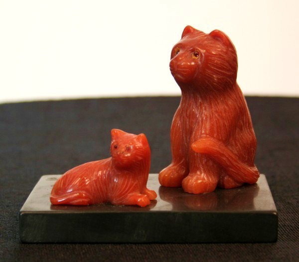 Russian Carved Carnelian Cats: Circa 1900-1920. Base measures 4 1/8 x 3 inches. Tallest figure is 3 inches.