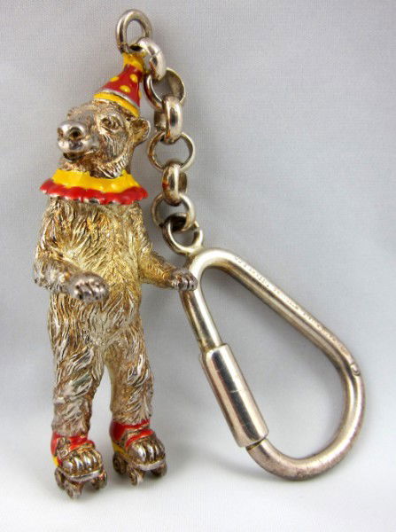 Tiffany Sterling & Enamel Keychain: Tiffany & Co. sterling silver and enamel keychain, bear on roller skates. A gift to the present owner by Gene Moore. Gene Moore (1910-1998) was vice-president of window display at Tiffany & Co. and is