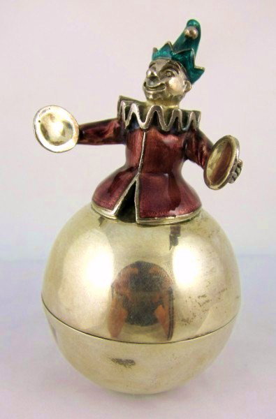 Tiffany & Co. Sterling & Enamel Circus Clown: Rare and very collectible Roly Poly sterling silver circus clown by Tiffany & Co. A few minor dents. A gift to the present owner by Gene Moore. Gene Moore (1910-1998) was vice-president of window disp