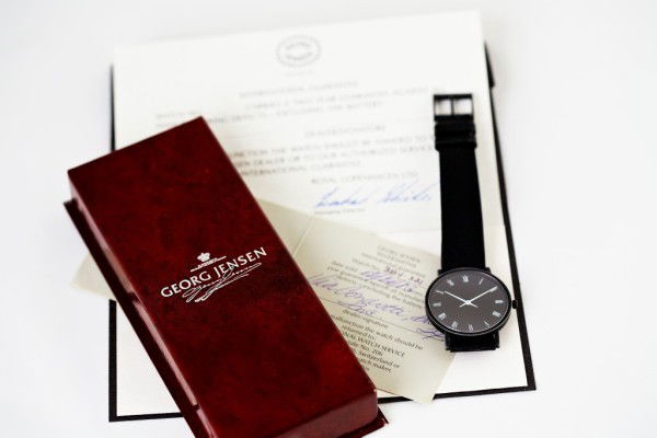 Georg Jensen Black Steel Wristwatch: Quartz movement with black leather strap. Designed by Henning Koppel for Georg Jensen.