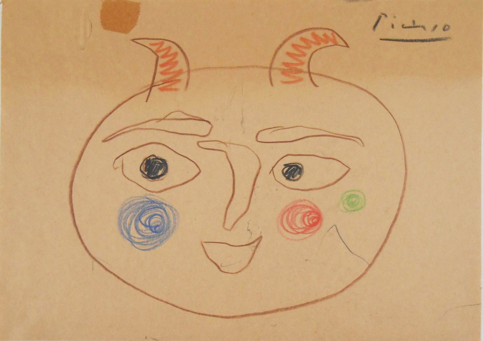 Pablo Picasso (1881-1973) Colored Pencil Sketch: Colored pencil sketch on tan-color wove paper, portrait of a faun, signed (*Pablo Picasso, 1881-1973). 5 1/4 x 7 1/4 inches. Very small tear, upper left with a small stain, neither affecting the drawi