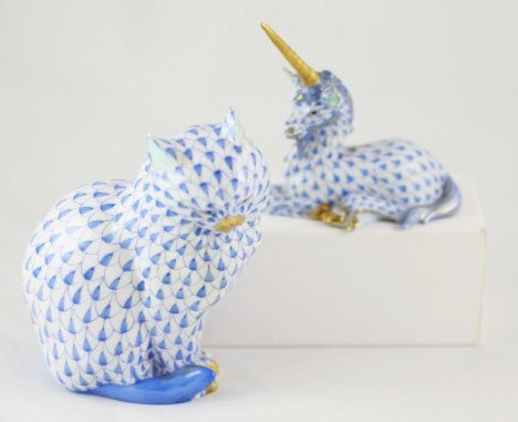 Herend Porcelain Cat & Unicorn: Two Herend porcelain figurines. The first, a seated cat; the second, a unicorn. Handpainted in blue and green on white ground with gold highlights. Unicorn measures 3 1/4 x 3 inches. Cat measures 4 1/
