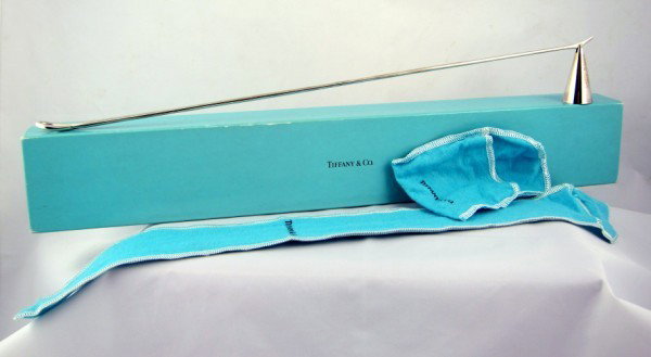 Tiffany & Co. Sterling Silver Candle Snuffer: Tiffany & Co. sterling silver candle snuffer by Elsa Peretti. Stamped Tiffany / Peretti / Italy. L. 17 inches. Together with original Tiffany & Co. box.