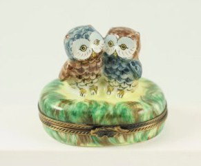 Limoges Porcelain Figural Trinket Box: Hinged Limoges trinket box, handpainted, circa mid-20th century. H. 2 inches. Excellent condition.