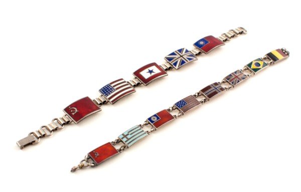 Vintage WWII Sterling Silver Sweetheart Bracelet: Wonderful vintage sterling silver link bracelet featuring beautifully enameled flags of the Allies of World War II. Included are the flags of Norway, Greece, China, United States, Great Britain, Russi
