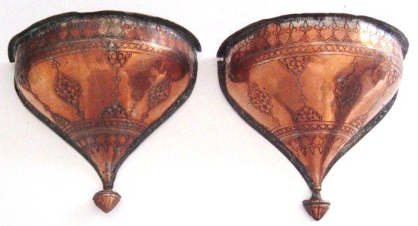 Antique Persian Copper Wall Planters: Wonderful pair of Persian copper planters, circa 1900. Nicely engraved. H. 9 inches. W. 9 3/4 inches. D. 4 3/4 inches. Very good condition.
