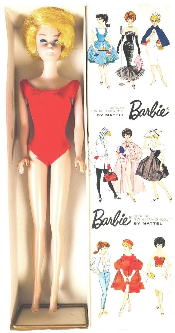 Mattel Barbie Doll, Circa 1963: Mattel Barbie doll with original box, 1963. Wear consistent with age.