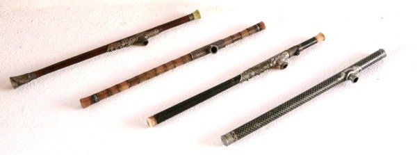 Antique Chinese Opium Pipes (4): Length of each pipe: approximately 22 inches. Very good overall condition. Lot Note: This item is located on-site at a prominent private estate in Santa Fe, New Mexico and ships from that location. Pr