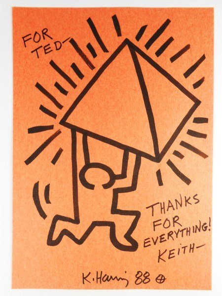 Keith Haring Felt-Pen Drawing: Original black felt-tip pen drawing attributed to Keith Haring (1958-1990), on orange construction paper. Inscribed, "For Ted, Thanks for everything!" Signed twice and dated '88. 12 x 8 1/2 inches. Ve