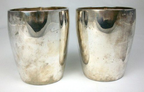 Two Sterling Silver Beakers, English, C. 1790: Pair of sterling silver beakers by John Hampston & John Prince, York, England, 1787-1794. Fully hallmarked. H. 3.25 inches. 4.375 oz. each. Very good condition.