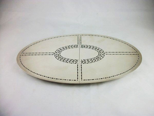 Tiffany Silverplated Trivet: Vintage pierced silverplate expanding trivet retailed by Tiffany & Co. 13 1/4 x 8 3/4 inches.