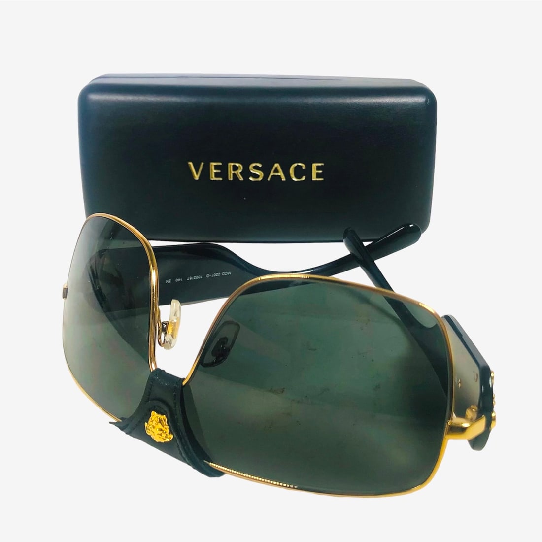 Versace Sunglasses & Case: Pair of Versace sunglasses with case. Like new condition.