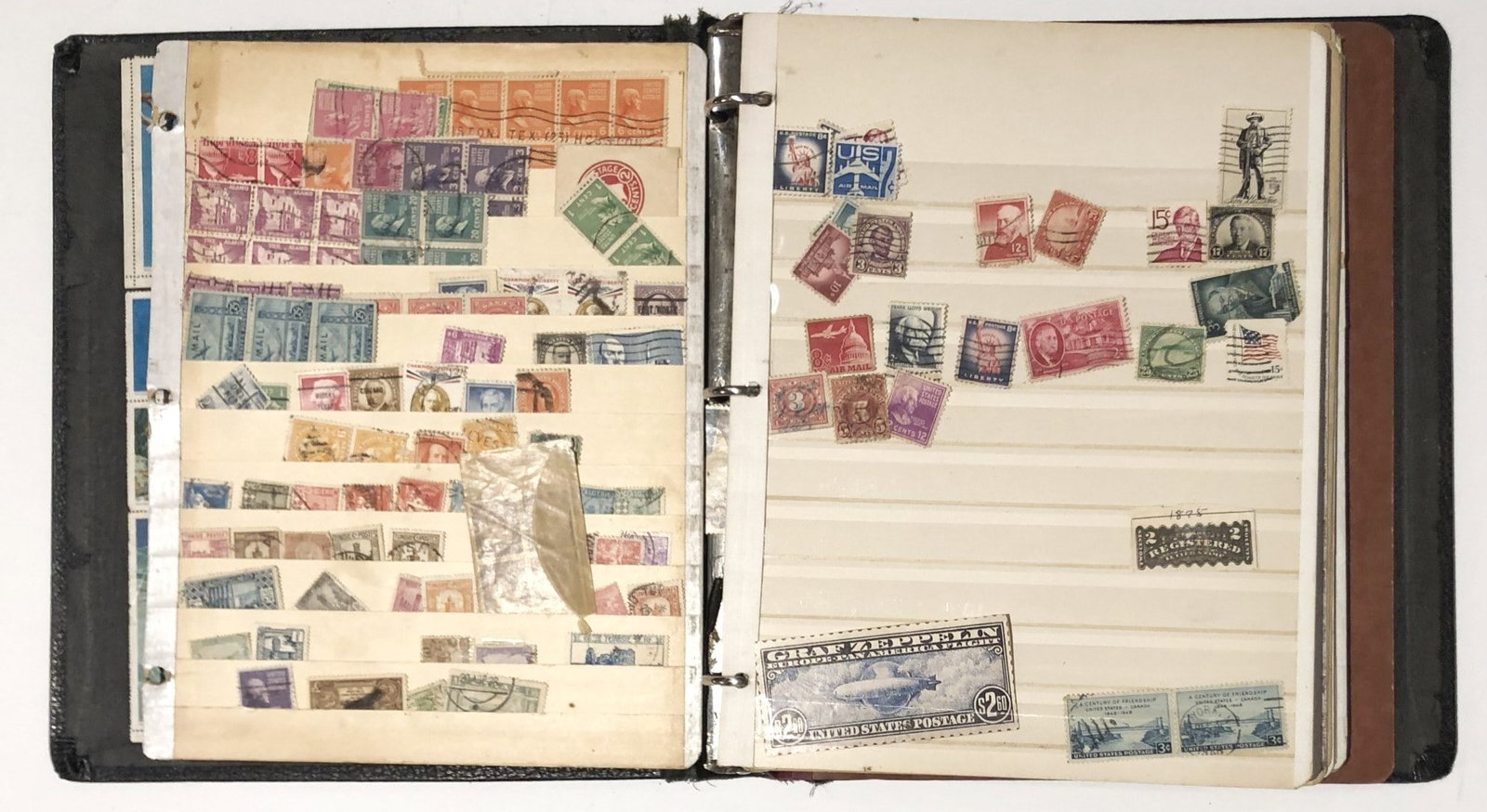 Lot Of Collectible U.S. & World Postage Stamps: Old binder with stock sheets full of old U.S. & world postage stamps. Removed from a recently deceased estate.