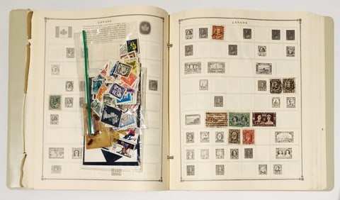 Two Binders With Collectible Old Postage Stamps