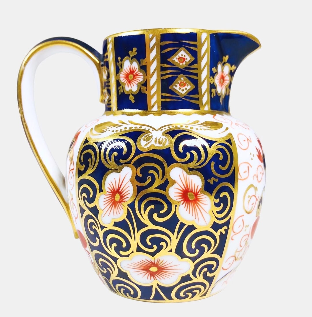 Royal Crown Derby Cream Pitcher: Royal Crown Derby cream pitcher, Traditional Imari pattern. Very good condition. H. 3 1/2 inches