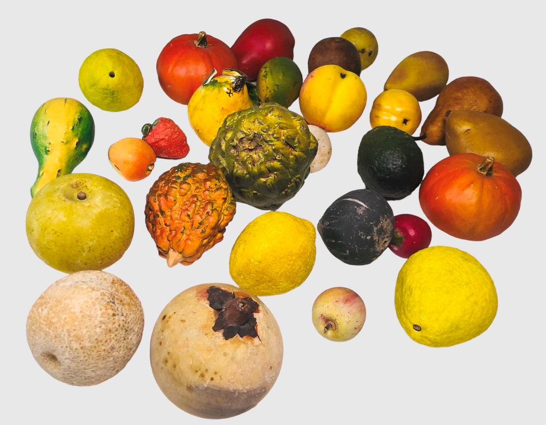 Group Of Handpainted Stone & Ceramic Fruits: Group of carved stone and ceramic fruits and vegetables, approximately 29 pieces, each realistically hand painted. Circa mid-20th century. Very good condition overall.