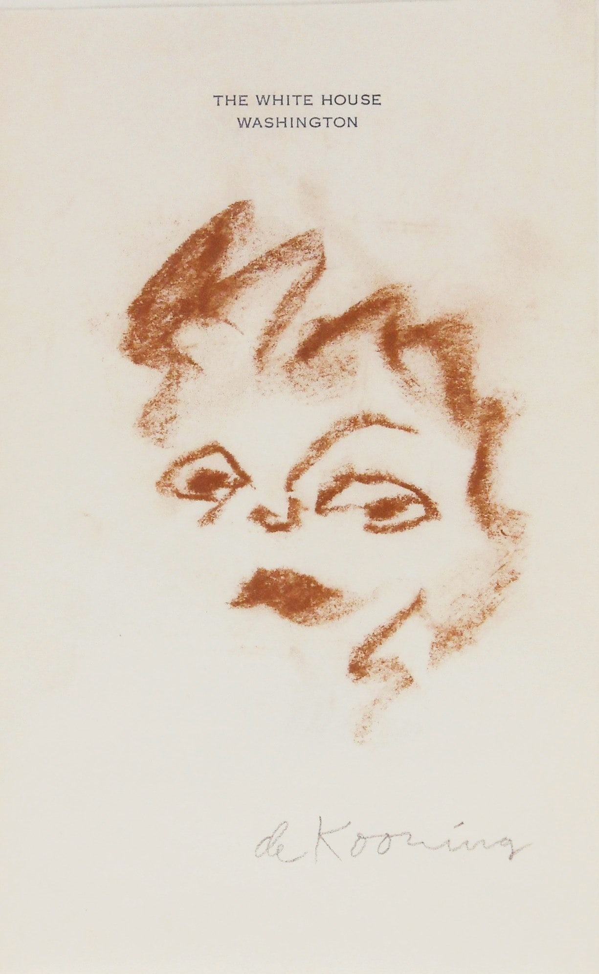 Willem De Kooning* (1904-1997) Chalk Drawing (See Guarantee & Disclaimer): Brown chalk drawing, untitled portrait of a woman, on official White House stationary watermarked with the Great Seal of the United States, signed (Willem de Kooning*, 1918-1989) 8 x 5 inches. Excelle