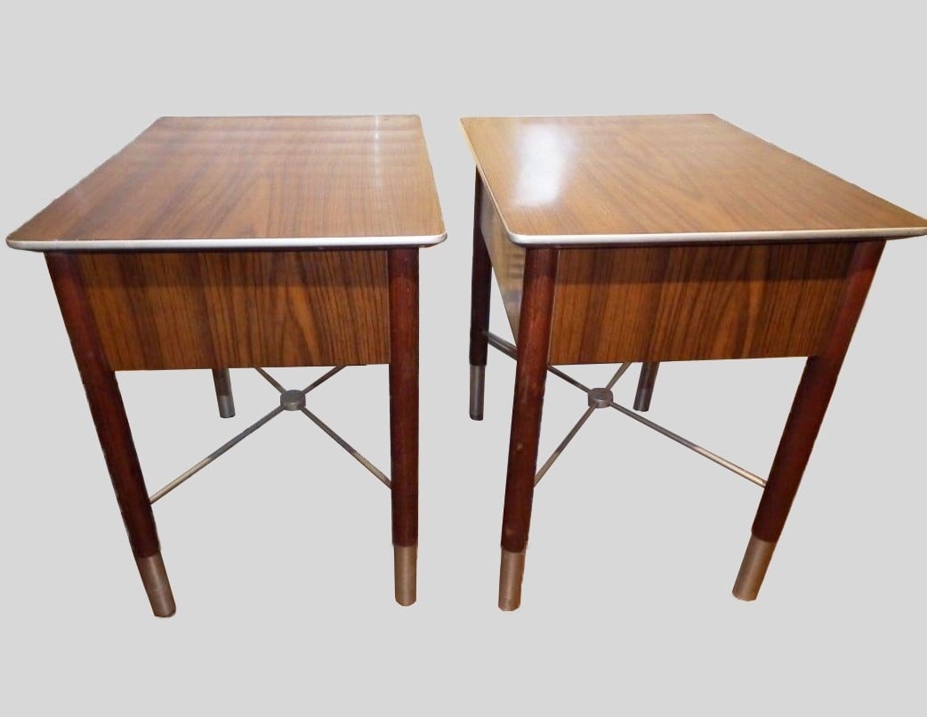 Mid-Century Modernist End Tables: Pair of mid-century modernist end tables signed Grosfeld House, Oneida NY. Wood, metal, and formica. Good condition overall. H. 24 inches W. 18 inches D. 24 inchesProvenance: New York Hilton Hotel, Ro