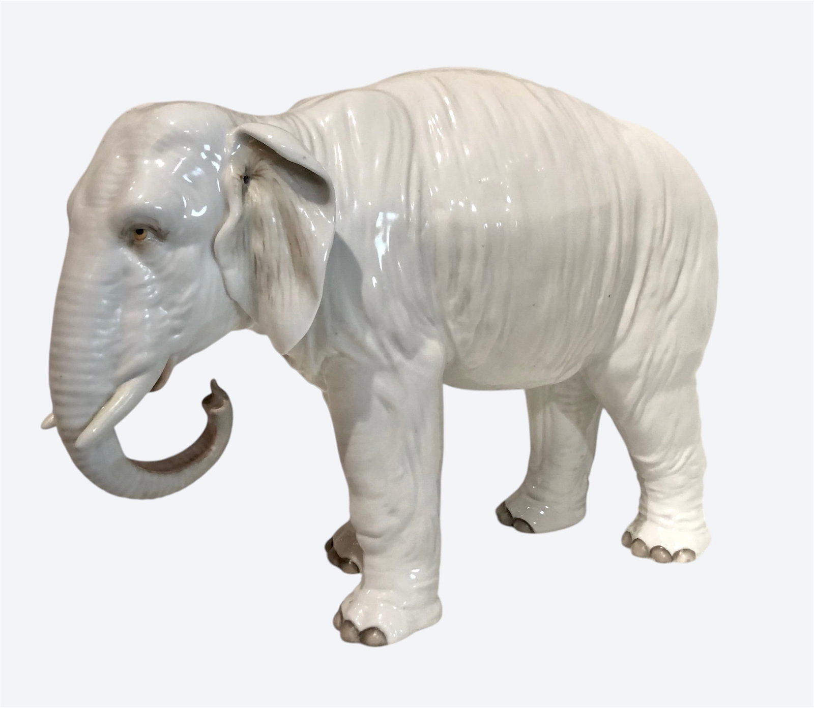 Porcelain Elephant, Continental, Circa 1900: Finely modeled figure of a standing elephant, probably Continental, possibly circa 1900. Excellent condition. Dimensions: H. 8 1/4 inches L. 11 inches W. 4 1/4 inches Lot Note: See Stair Auctions for 