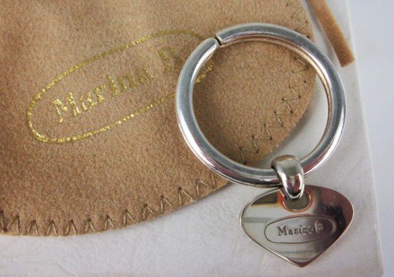 Marina Bulgari Sterling Key Ring: Sterling silver key ring by Marina Bulgari, circa 1980-1990. Together with original pouch and box. Total weight: 13 grams. Excellent condition.