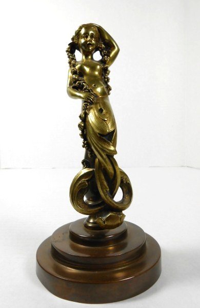Bronze Mermaid With Streaming Garland: Interesting Art Nouveau bronze figure of a mermaid holding a garland of fruit and flowers. Unsigned. Mounted on an associated round, stepped bronze plinth. Probably French, circa 1900-1910. Possibly a