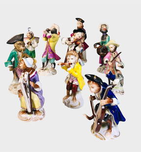 German Porcelain Monkey Band: German porcelain ten-piece monkey band, comprising musicians with their instruments, circa late 19th/early 20th century. Various marks, one Meissen. Two of the figures have small losses (see photograp