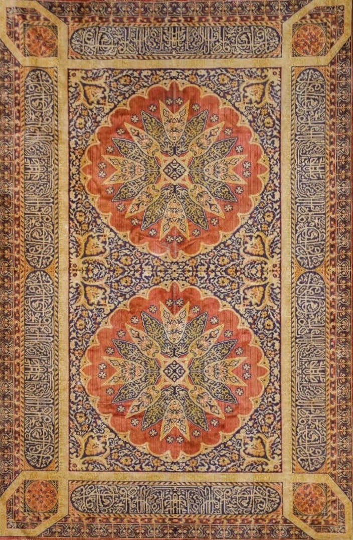 Arabic Carpet, Circa Early 20th Century: Arabic carpet, overall floral motif, primary colors include warm pinks, purples, and beige. Arabian Peninsula, circa 1920-1940. Wear commensurate with age. Dimensions: L. 75 inches W. 48 inches
