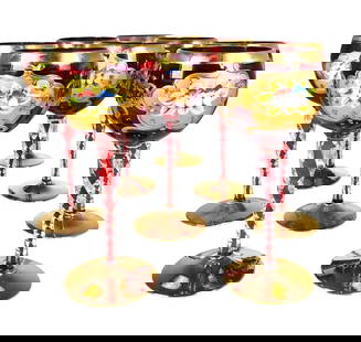 Venetian Murano Wine Goblets (8), Circa 1980: Set of eight (8) vintage ruby red Murano-glass wine goblets, with twisted stems and extensive 24KT gold accents and enamel flowers. Excellent condition.Dimensions: H. 7 inches Dia. 2 3/4 inches