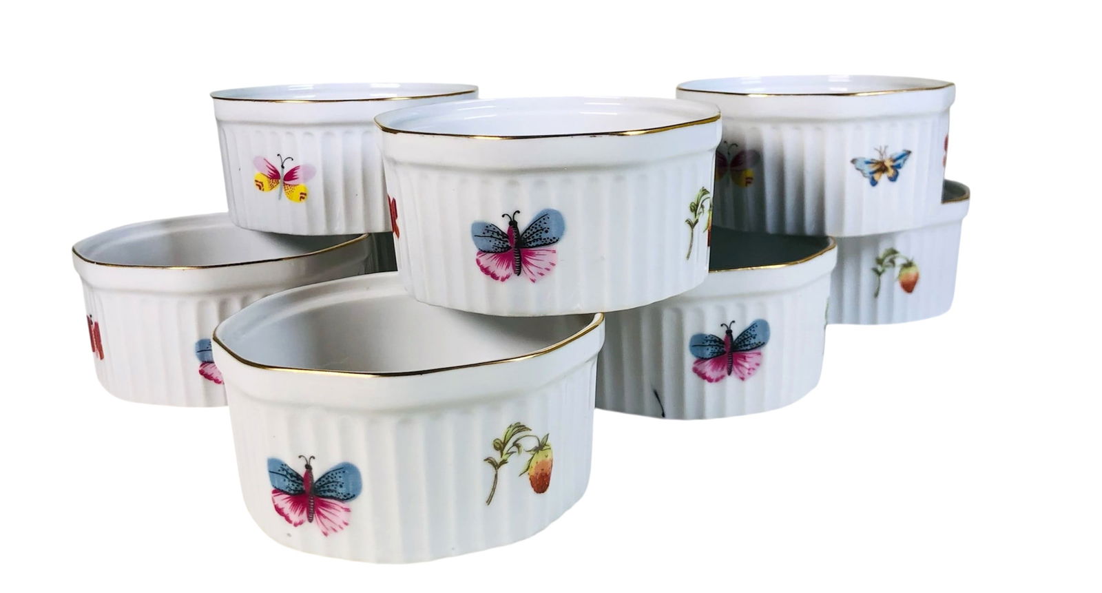 Souffle Ramekins (8): Set of modern souffle ramekins, each decorated with fruit and butterflies. Excellent condition.Dimensions: Dia. 4 inches H. 2 inches