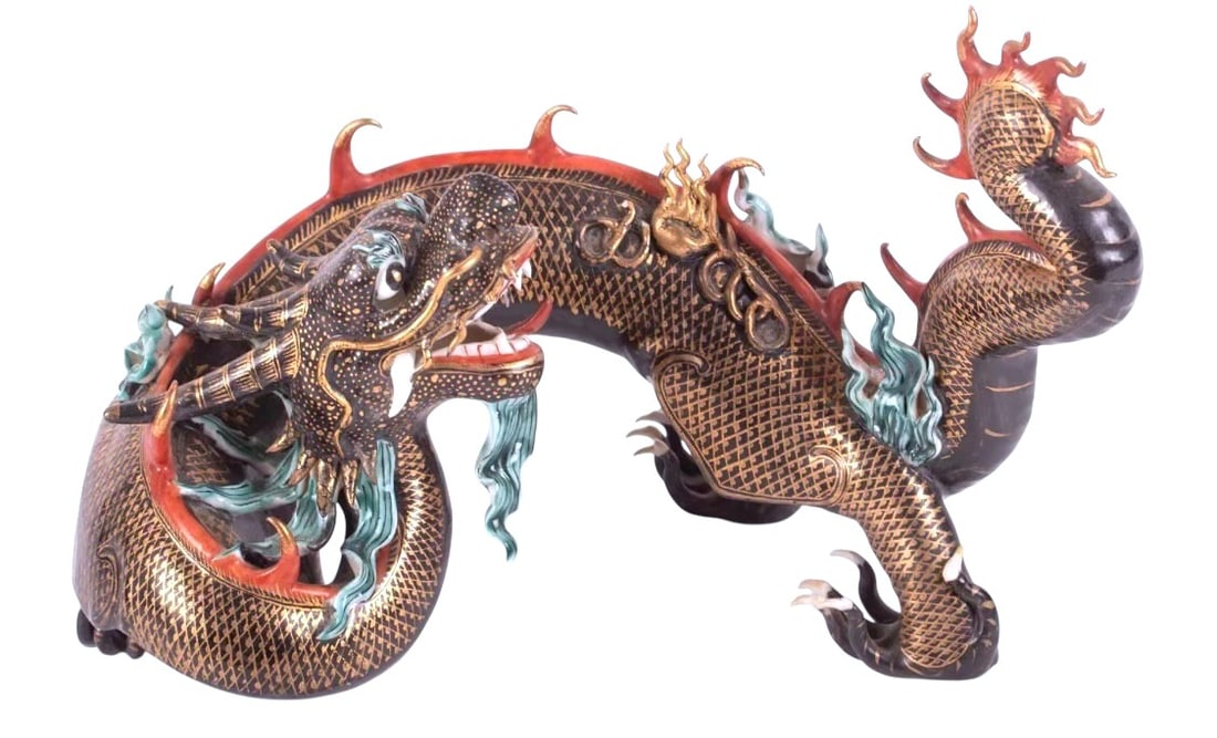 Chinese Porcelain Dragon, Qing Dynasty: Finely painted porcelain dragon, Chinese, circa late-Qing Dynasty or early-Republican Period. Very good condition. Dimensions: L. 10 3/4 inches H. 7 inches D. 6 inches