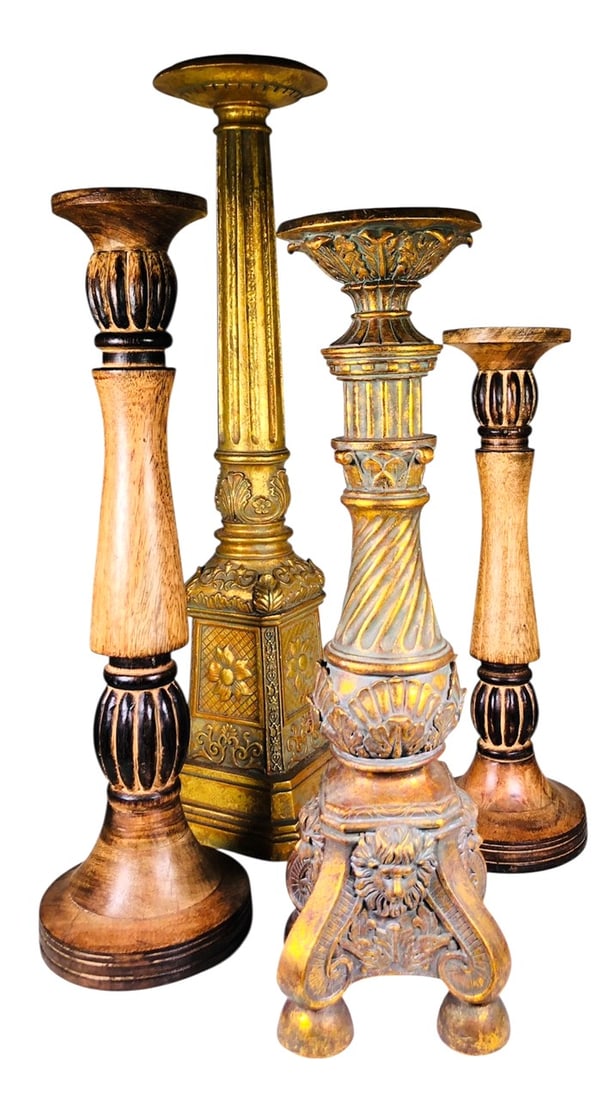 Group Of Four Decorator Candlesticks: Group of four decorator candlesticks. Late 20th century. No apparent damage or repairs.Dimensions: (largest) H. 25 inches W. 6 1/2 inches D. 6 1/2 inches